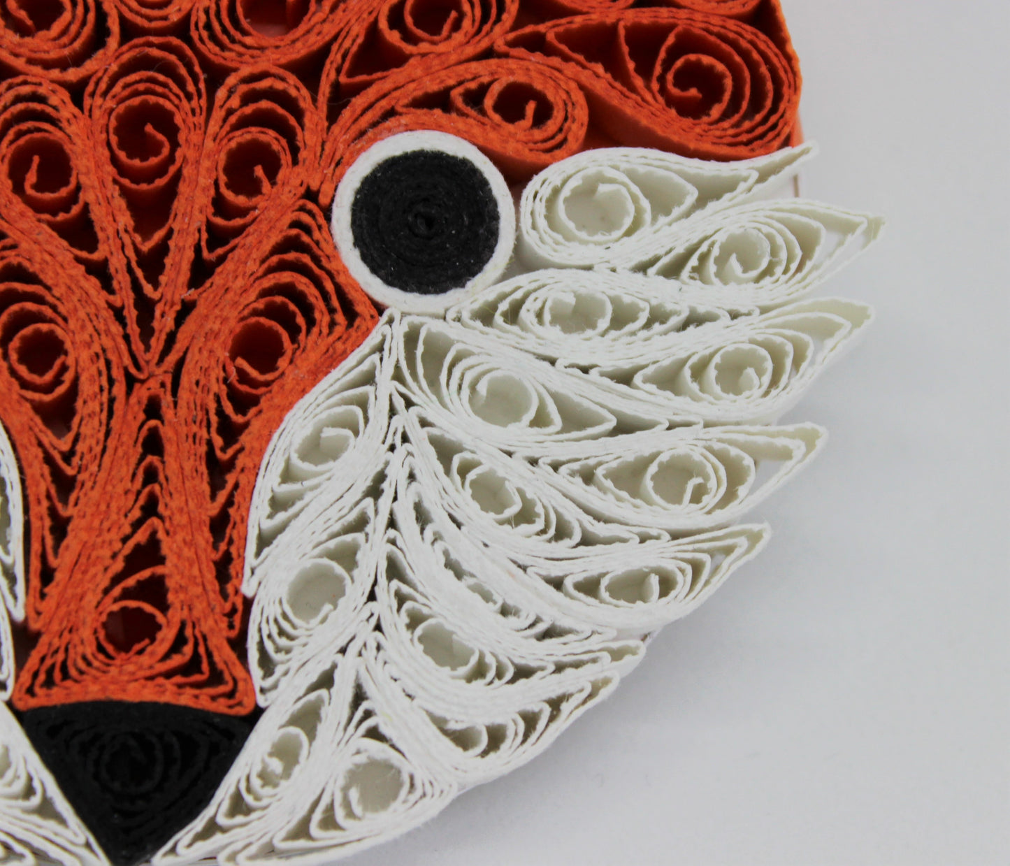 close up view of quilled paper red fox magnet