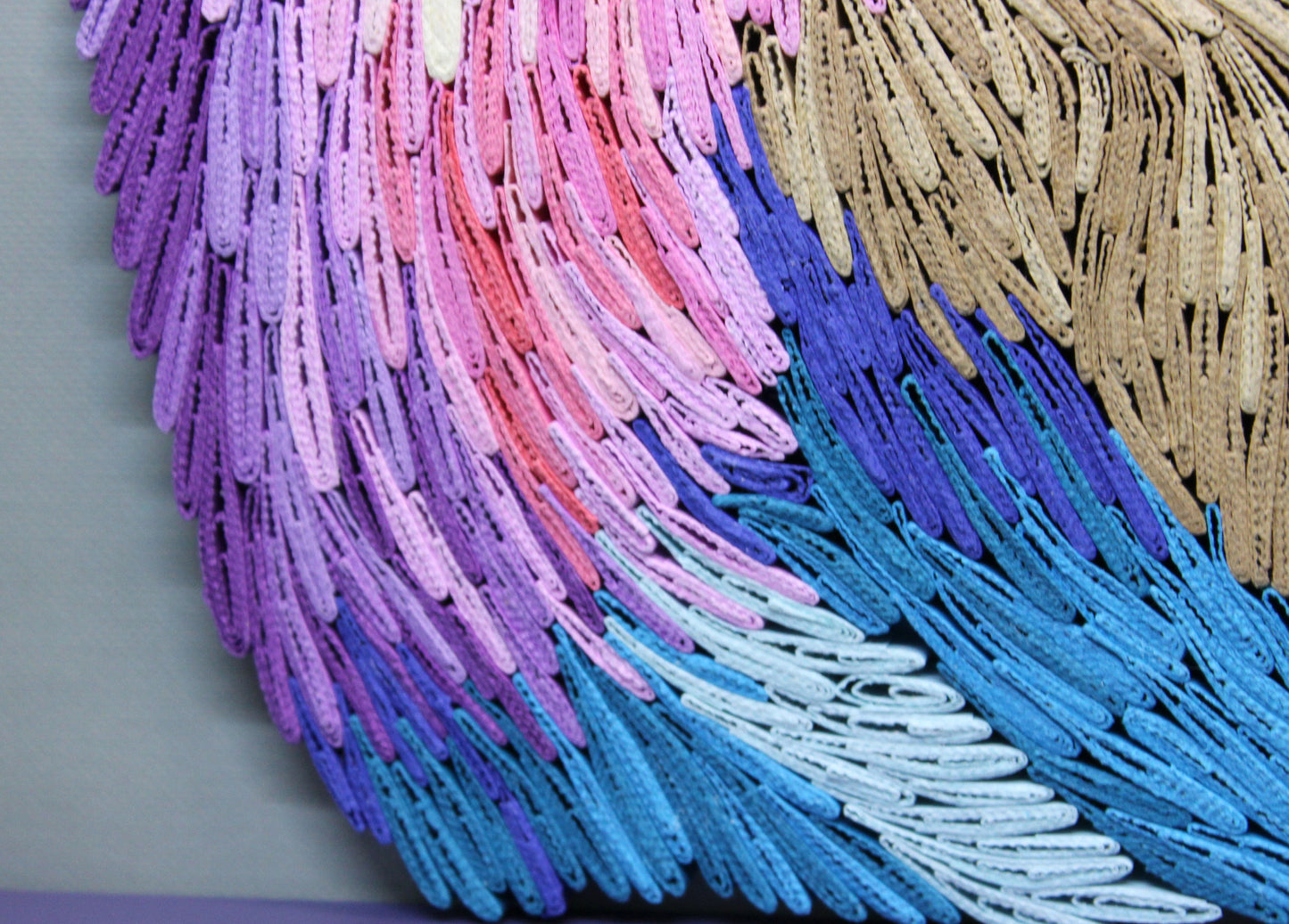 close up view of quilled plumage of lilac-breasted roller bird