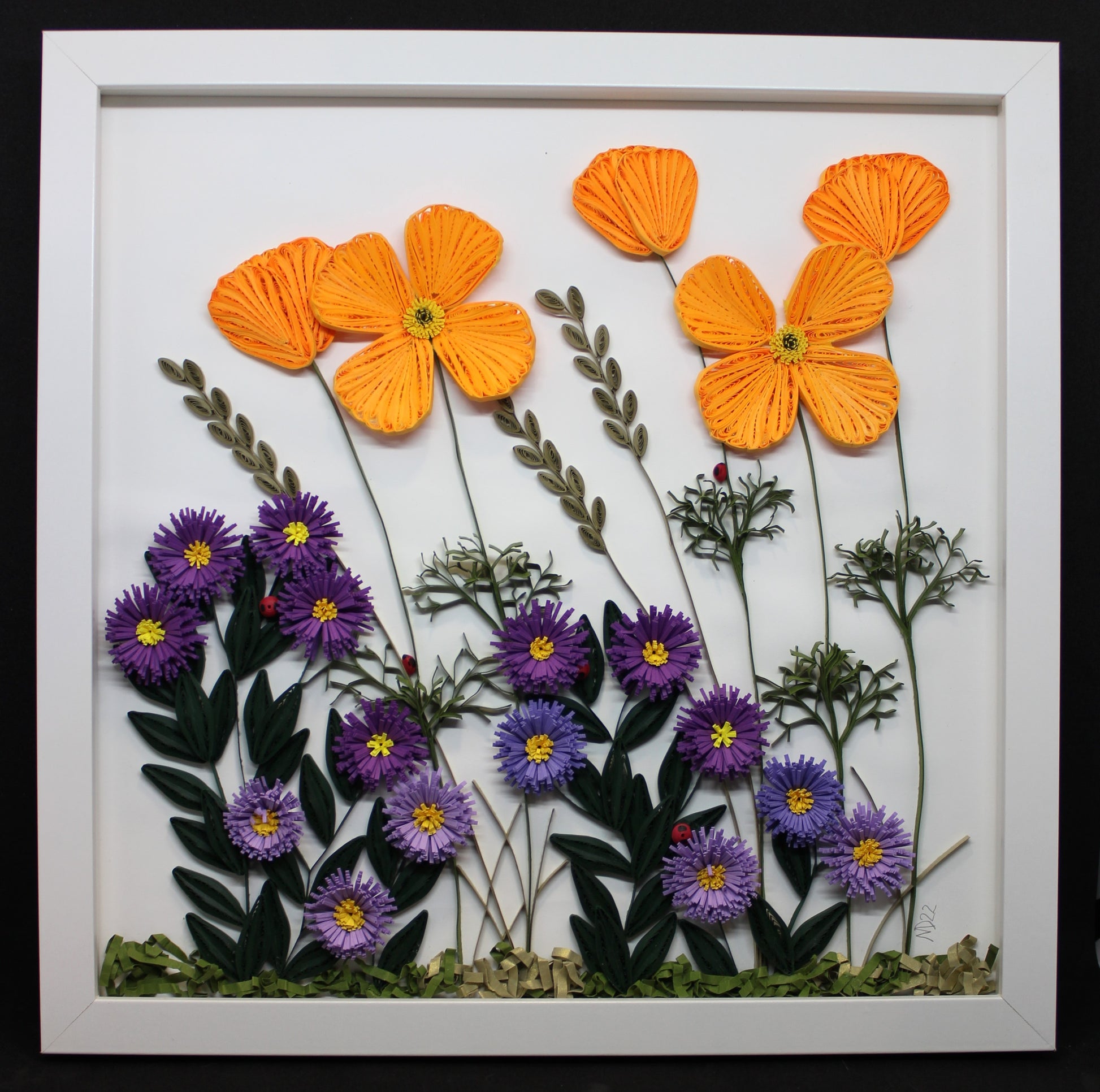 quilled paper wildflower arrangement with orange poppies, purple asters, grasses, and ladybugs